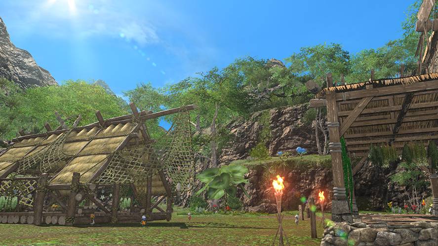 A bright, sunny in-game screenshot from Final Fantasy XIV showing an outdoor tropical island sanctuary area with thatched-roof wooden buildings, fishing nets, torches, and rocky cliffs under a clear blue sky.