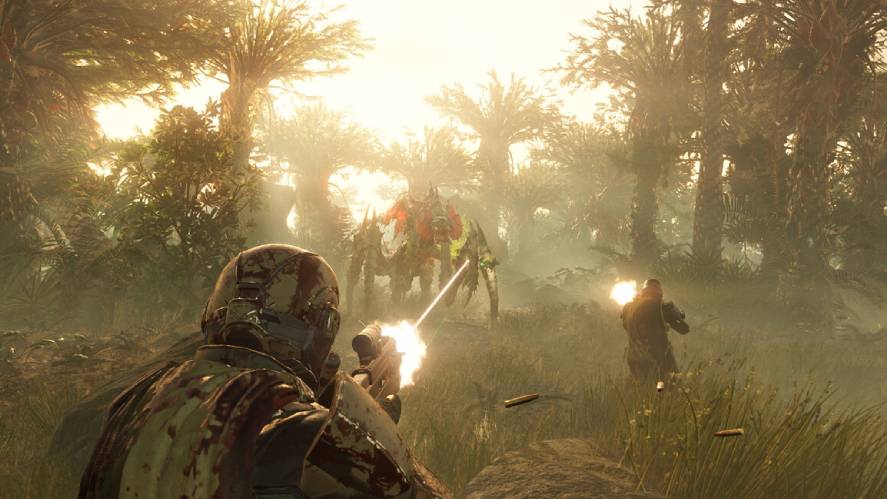 A third-person gameplay screenshot from Helldivers 2, showing a squad of Helldivers in armor and capes firing weapons at a large spider-like Automaton or Terminid enemy amidst a hazy, sunlit jungle filled with tall palm-like trees, flying bullets, and ejected casing shells.