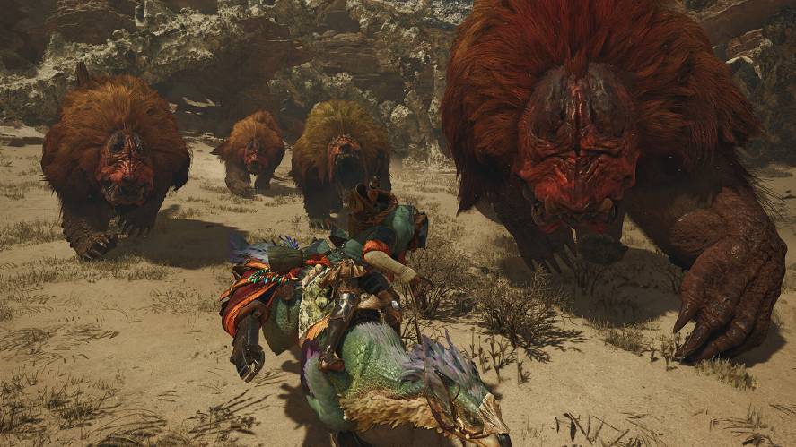 Screenshot from Monster Hunter Wilds showing a hunter riding a Seikret mount while being charged by a pack of massive, red-furred monsters across a rocky desert landscape.